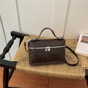 Dark brown woven vanity crossbody bag, stylish top handle shoulder bag for women daily commute.