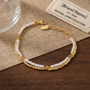 Double layer pearl bracelet with irregular gold metal links french vintage jewelry detail