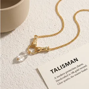 Natural white quartz 18k gold vermeil necklace elegant hand motif pendant detail shot