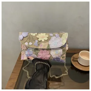 Embroidered floral chain crossbody bag detail, elegant casual women's shoulder handbag