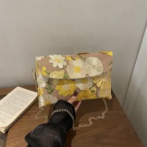 Embroidered floral canvas crossbody bag with elegant gold chain strap for women summer.
