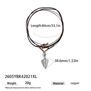 Bohemian ethnic style leather cord long sweater necklace with leaf pendant and bead details.
