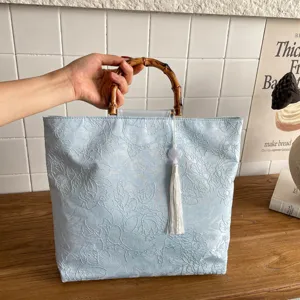 Sac cabas en lin style chinois avec poignée en bambou et pompon pour femmes sac à main