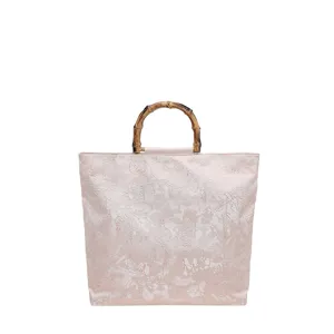 Sac à main élégant en lin avec poignée en bambou, fourre-tout pour femme style chinois chic.