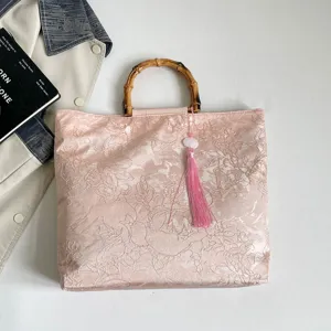 Elegante chinesische Bambusgriff Jacquard Handtasche für Damen stilvolle rosa Abendtasche