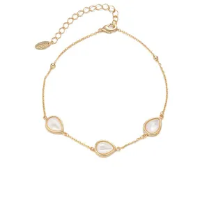 Gold plated chain bracelet featuring three elegant teardrop mother of pearl charms with extender.