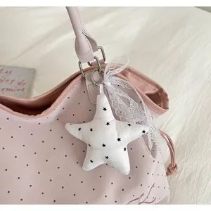 Pink polka dot tote bag with a cute white star lace pendant for daily commute and casual use.