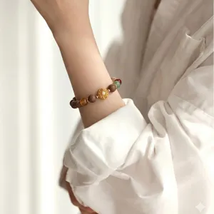 Chinese style beaded bracelet with sandalwood, agate, quartz and pearl charm for women detail view.