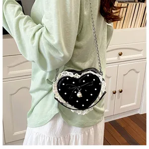 Korean style polka dot heart cross body bag with cute bow lace fringe and pearl chain.