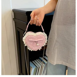 Korean style polka dot heart children bag with bow lace and pearl pendant for cute girls.
