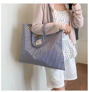Große gestreifte Tragetasche für Damen, lässige Retro Canvas Schultertasche für den Alltag.