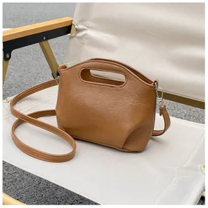 Sac à main rétro en cuir souple marron, élégant sac bandoulière avec poignée supérieure.