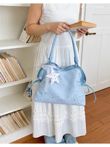 Light blue tote bag with star rhinestones and lace star pendant, perfect for daily commute.