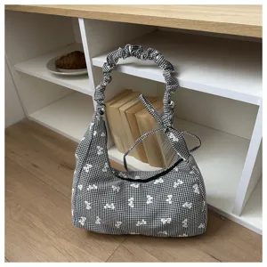 Black white gingham shoulder bag with cute bow prints and ruffled strap design for daily use