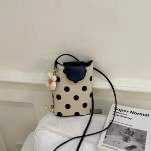 Stylische Damen Umhängetasche aus Canvas mit Punkten und Blumenanhänger, kleine Handytasche.