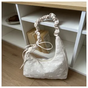 Beige plaid shoulder bag detail, cute bow embroidery, ruffled strap aesthetic fashion.