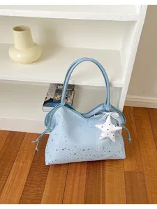 Detailed view of light blue star rhinestone tote bag with cute star pendant, casual style.