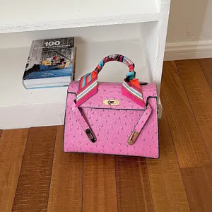 Bolso de mano rosa con textura de avestruz y pañuelo, elegante bolso de hombro para mujer.