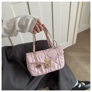 Pink quilted chain shoulder bag, elegant faux leather crossbody purse for women.
