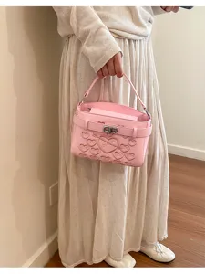 Pink leather shoulder bag with heart embossing and metal lock for women fashion style