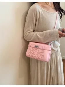 Pink heart embossed shoulder crossbody bag with metallic lock for women fashion daily use