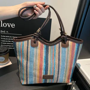 Striped straw tote bag for women, large capacity summer beach shoulder bag, casual commuter handbag.