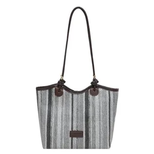 Stylish striped woven tote bag for women, casual commuting shoulder handbag with contrast color.