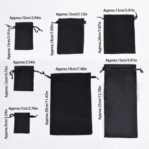 Various sizes of black satin drawstring bags with dimensions in cm and inches