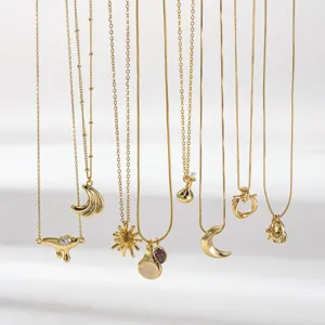 Gold hanging necklaces set featuring multi styles like moon, starburst and natural stones.