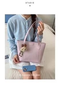 Stylish pink PU leather tote bag for women, large capacity casual shoulder bag with bear charm.