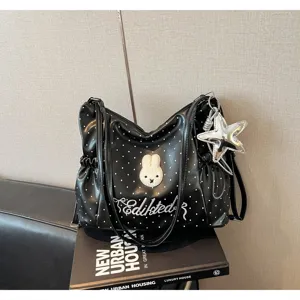 Borsa a tracolla nera a pois con grazioso cerotto di coniglio e ciondolo stella.