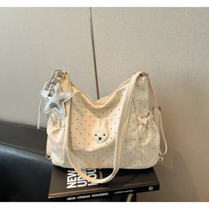 Borsa a tracolla a pois beige con ricamo di coniglietto carino e ciondolo stella per donne.