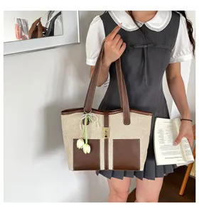 Contrast color canvas tote bag for women, stylish large capacity shoulder bag for commuting.