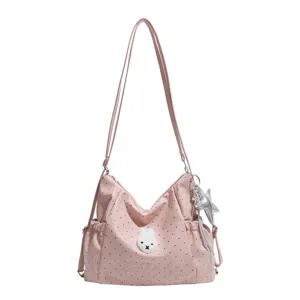 Elegante borsa a zaino e tracolla rosa a pois con grande capacità per le donne