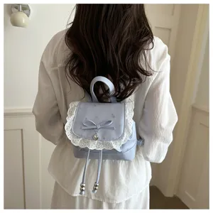 Zaino piccolo floreale da donna dolce, fiocco in pizzo carino, borsa casual alla moda.