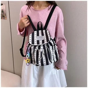 Black and white striped backpack for students, sweet style daily casual school bag.