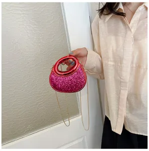 Mini glitter evening bag with metal round handle and chain strap for women party.