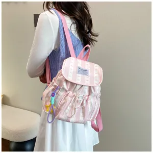 Pink striped canvas backpack for daily commuting, casual school bag with cute star pendant.