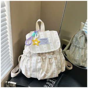 Beige striped casual backpack for students, cute bow design with star charm and large capacity.