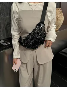 Black sequin crossbody bag for women, wide strap fashionable dumpling shoulder bag detail shot.