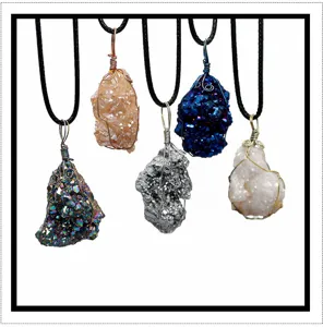 Raw crystal cluster pendant detail shot showing unique irregular gemstone textures and vivid colors.