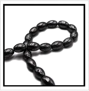 Electroplated black lava stone bead detail showing metallic texture for DIY bracelet accessories.