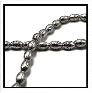 Silver electroplated lava stone barrel beads close up, perfect for DIY handmade bracelets.