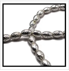 Silver electroplated volcanic stone barrel beads detail, perfect for DIY bracelets and jewelry.