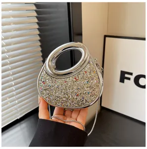 Women silver evening bag sparkly crescent handbag with acrylic metallic handle for party.