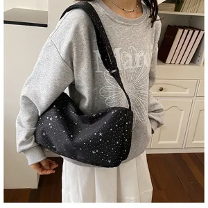 Zwarte canvas schoudertas met stermotief, grote casual crossbodytas voor dagelijks gebruik.