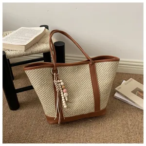 Gevlochten strooien shopper tas voor dames, zomerse schoudertas met PU lederen afwerking.