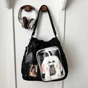 Zaino ita nero con stampa di stelle, finestra trasparente e peluche per tutti i giorni.