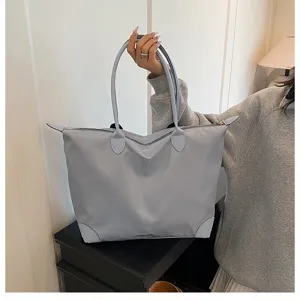 Grey large capacity nylon travel tote bag, waterproof lightweight casual handbag for women.