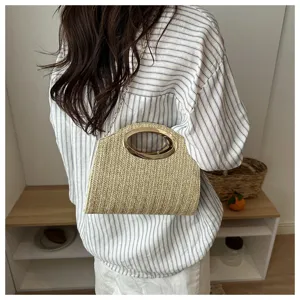 Borsa a mano in paglia intrecciata con manico ovale in metallo borsa donna elegante